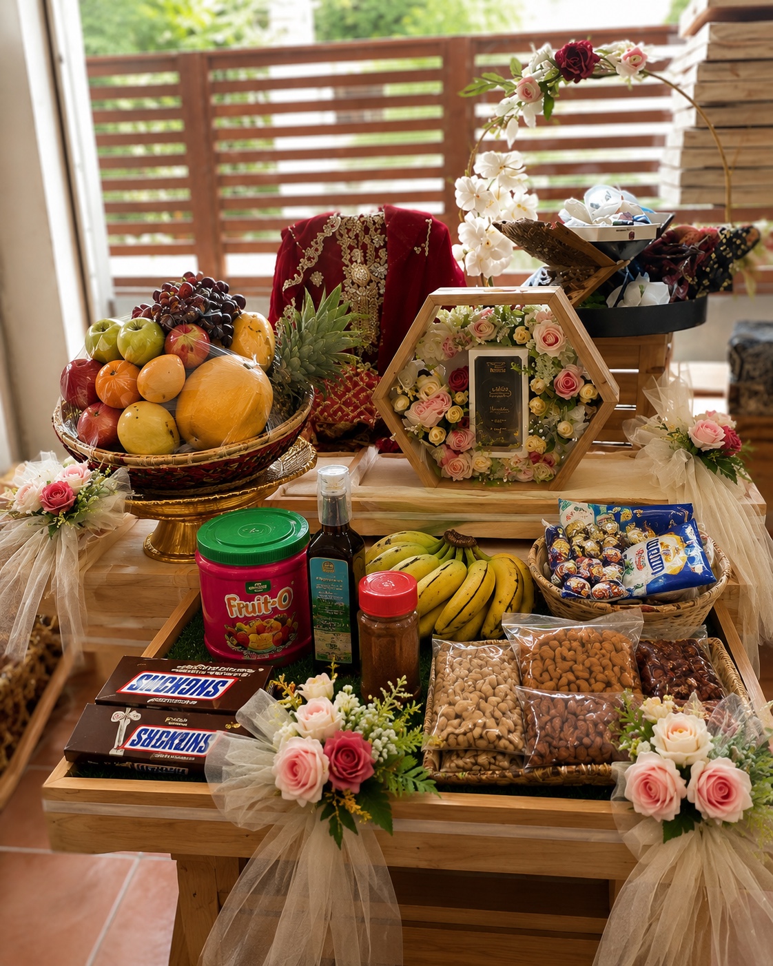 Wedding gift tray with fruits, sweets and flowers